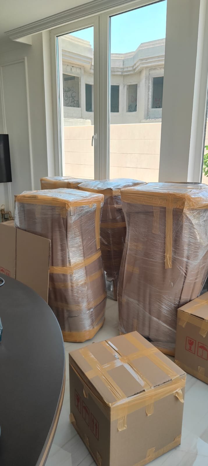PackPoint Movers residential moving team packing furniture in Dubai